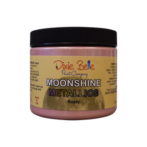 Moonshine Metallic chalk mineral paint is a one step, rich and shiny metallic with beautiful pigments. Available in 16 oz.  Gold Digger: Paint this bright metallic color on top of Colonel Mustard or Burlap!  Rozay: Paint this beauty on top of Tea Rose or Soft Pink to create something sweet. To make a dreamy Rose Gold, mix Gold Digger with Rozay!  Silver Bullet: Use this stunning color over Sawmill Gravy or Driftwood!  Steel Magnolia: Use this luminous color over French Linen or Dried Sage for a sophisticate