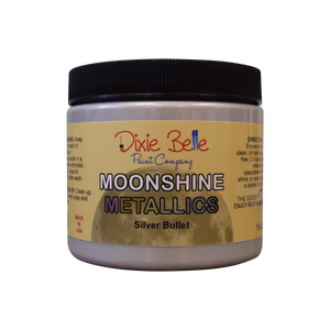Moonshine Metallic chalk mineral paint is a one step, rich and shiny metallic with beautiful pigments. Available in 16 oz.  Gold Digger: Paint this bright metallic color on top of Colonel Mustard or Burlap!  Rozay: Paint this beauty on top of Tea Rose or Soft Pink to create something sweet. To make a dreamy Rose Gold, mix Gold Digger with Rozay!  Silver Bullet: Use this stunning color over Sawmill Gravy or Driftwood!  Steel Magnolia: Use this luminous color over French Linen or Dried Sage for a sophisticate